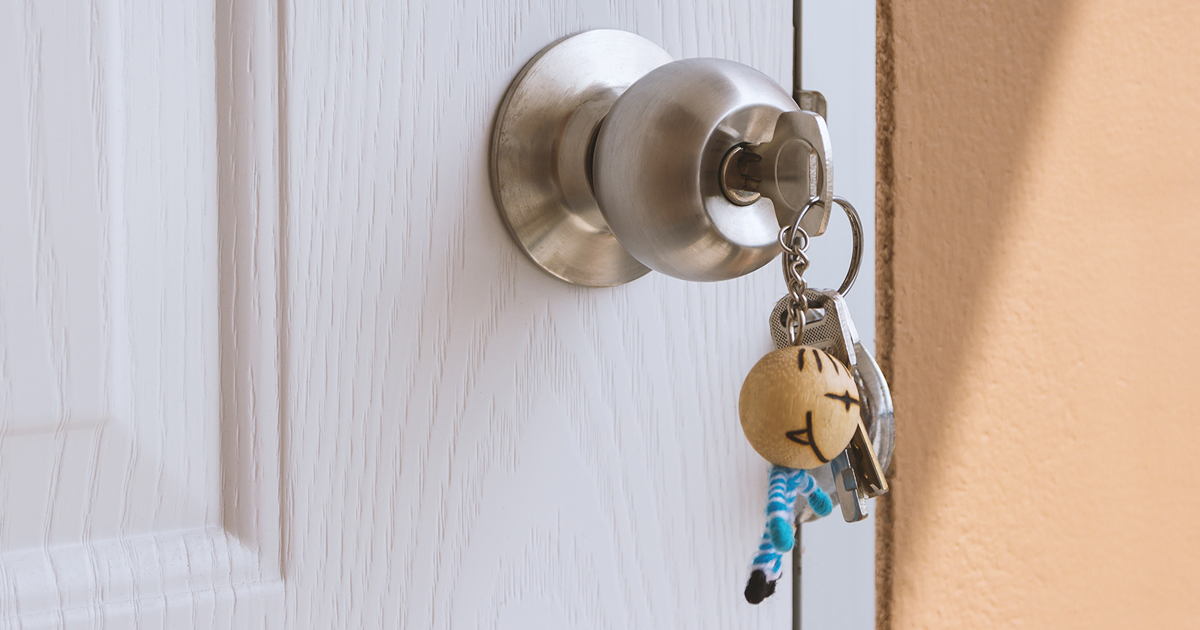 Door knob and a keychain with keys on it